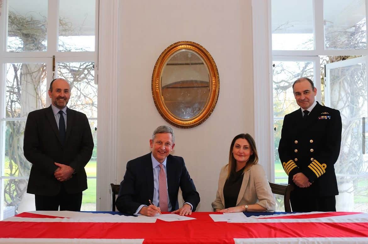 CEO Andrew Ashton signing the Armed Forces Covenant